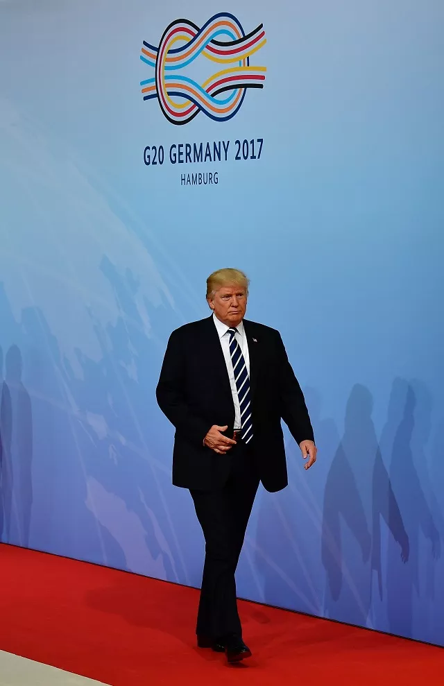 us president donald trump arrives to attend the g20 summit in hamburg northern germany on july 7 2017 leaders of the world 039 s top economies gather from july 7 to 8 2017 in germany for likely the stormiest g20 summit in years with disagreements ranging from wars to climate change and global trade photo afp us president donald trump arrives to attend the g20 summit in hamburg northern germany on july 7 2017 leaders of the world 039 s top economies gather from july 7 to 8 2017 in germany for likely the stormiest g20 summit in years with disagreements ranging from wars to climate change and global trade photo afp