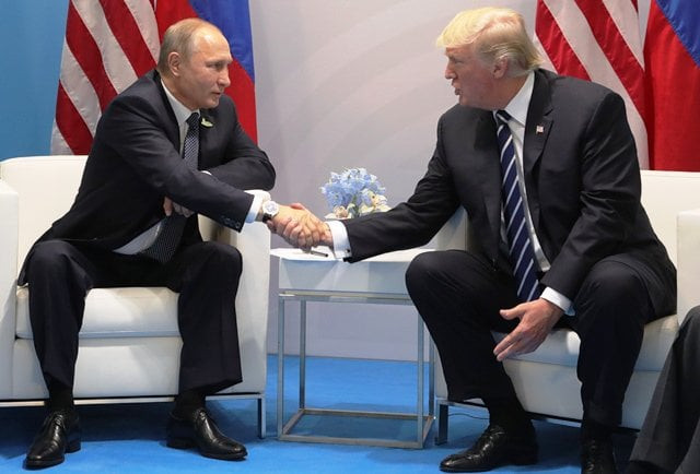 us president donald trump right and russia 039 s president vladimir putin shake hands as they hold a meeting on the sidelines of the g20 summit in hamburg germany on july 7 2017 photo afp us president donald trump right and russia 039 s president vladimir putin shake hands as they hold a meeting on the sidelines of the g20 summit in hamburg germany on july 7 2017 photo afp