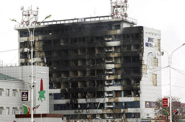 the burnt exterior of the press house a local media agency is seen in the chechen capital grozny december 4 2014 photo reuters the burnt exterior of the press house a local media agency is seen in the chechen capital grozny december 4 2014 photo reuters