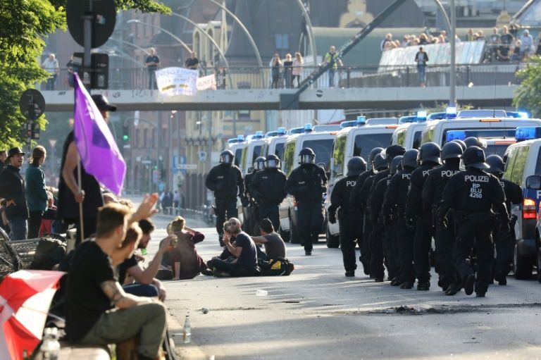 resh clashes erupted early sunday in the streets of hamburg following the end of the g20 summit with protesters setting fire to a number of vehicles police said photo afp