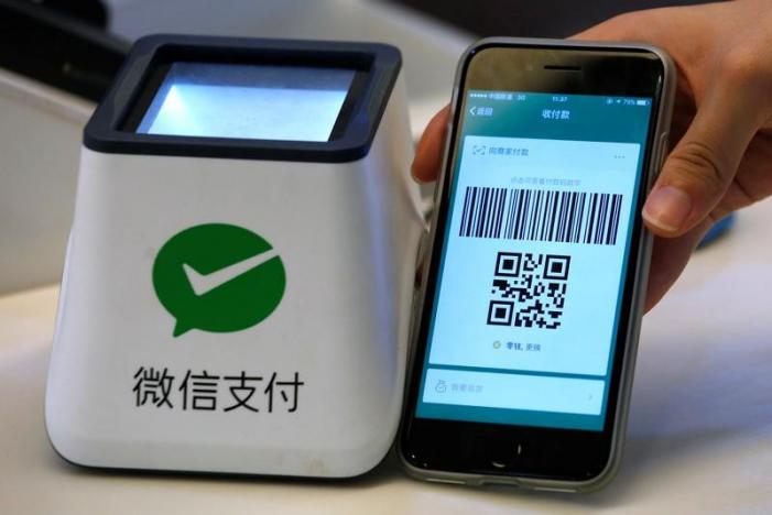 a wechat pay system is demonstrated at a canteen in guangzhou china photo reuters