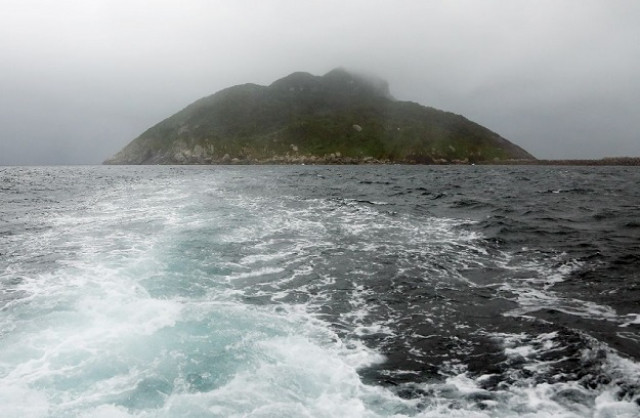 a view of okinoshima island which was inscribed at the 41st session of the unesco world heritage committee held in poland photo afp a view of okinoshima island which was inscribed at the 41st session of the unesco world heritage committee held in poland photo afp