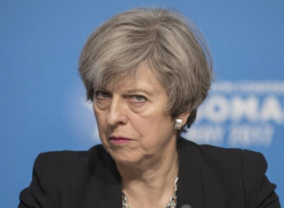 weakened theresa may reaches out to rivals