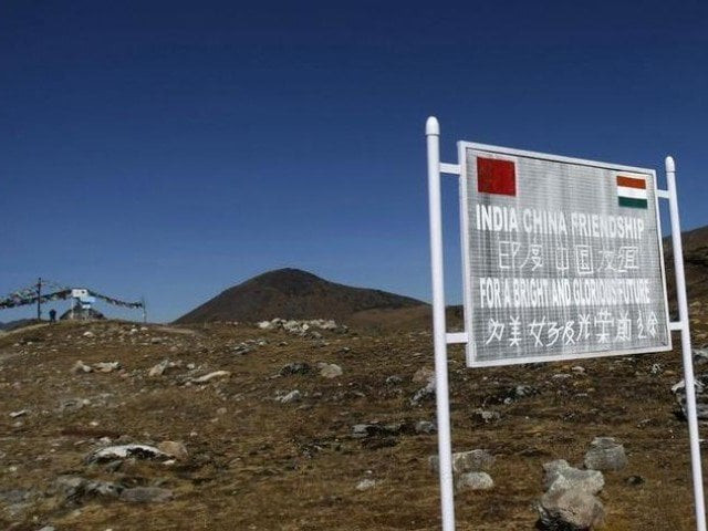 a signboard is seen from the indian side of the indo china border at bumla in arunachal pradesh photo reuters a signboard is seen from the indian side of the indo china border at bumla in arunachal pradesh photo reuters