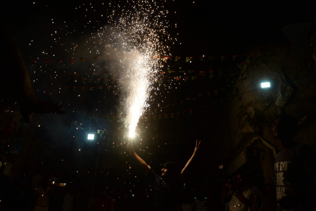 revellers celebrate the ppp s win in ps 114 the party campaigned extensively for the seat photo mohammad noman express