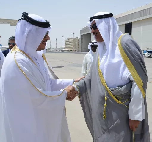 a handout picture released by the emiri diwan in kuwait on july 3 2017 shows kuwaiti foreign minister sheikh sabah al khaled al sabah r shaking hands with qatari foreign minister sheikh mohammad bin abdulrahman al thani at kuwait international airport in kuwait city photo afp a handout picture released by the emiri diwan in kuwait on july 3 2017 shows kuwaiti foreign minister sheikh sabah al khaled al sabah r shaking hands with qatari foreign minister sheikh mohammad bin abdulrahman al thani at kuwait international airport in kuwait city photo afp