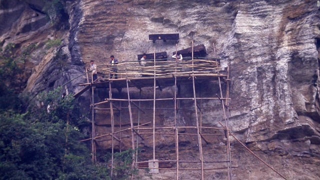 bamboo scaffolding erected to allow a cers team to excavate the coffins in yunnan photo cnn