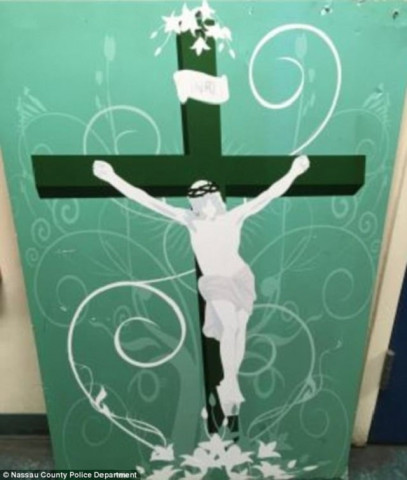 the green and white painting of jesus hanging on the cross was left outside hillsdale mosque photo nassau police county the green and white painting of jesus hanging on the cross was left outside hillsdale mosque photo nassau police county