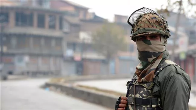 an indian paramilitary trooper stands guard during a clampdown in iok photo afp an indian paramilitary trooper stands guard during a clampdown in iok photo afp