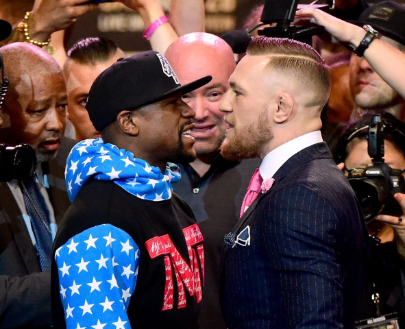 boxing meets mma more than 11 000 fans crowded into los angeles 039 s staples center for a raucous first live showdown between former boxing world champion mayweather and irishman mcgregor photo afp boxing meets mma more than 11 000 fans crowded into los angeles 039 s staples center for a raucous first live showdown between former boxing world champion mayweather and irishman mcgregor photo afp