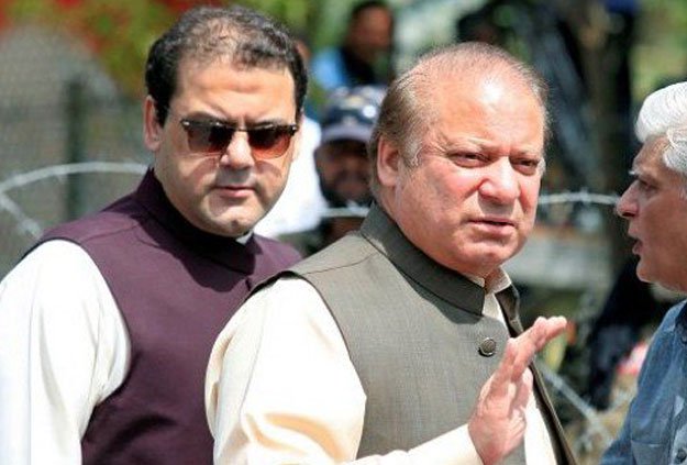 hussain nawaz with pm nawaz sharif photo reuters