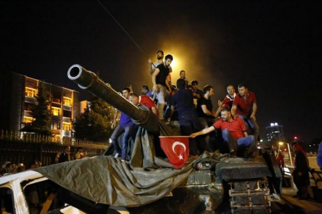 people stand on a turkish army tank in ankara turkey july 16 2016 photo reuters people stand on a turkish army tank in ankara turkey july 16 2016 photo reuters