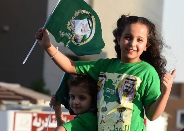 a saudi girl waves a flag during celebrations marking saudi arabian national day in riyadh on september 23 2016 photo afp a saudi girl waves a flag during celebrations marking saudi arabian national day in riyadh on september 23 2016 photo afp