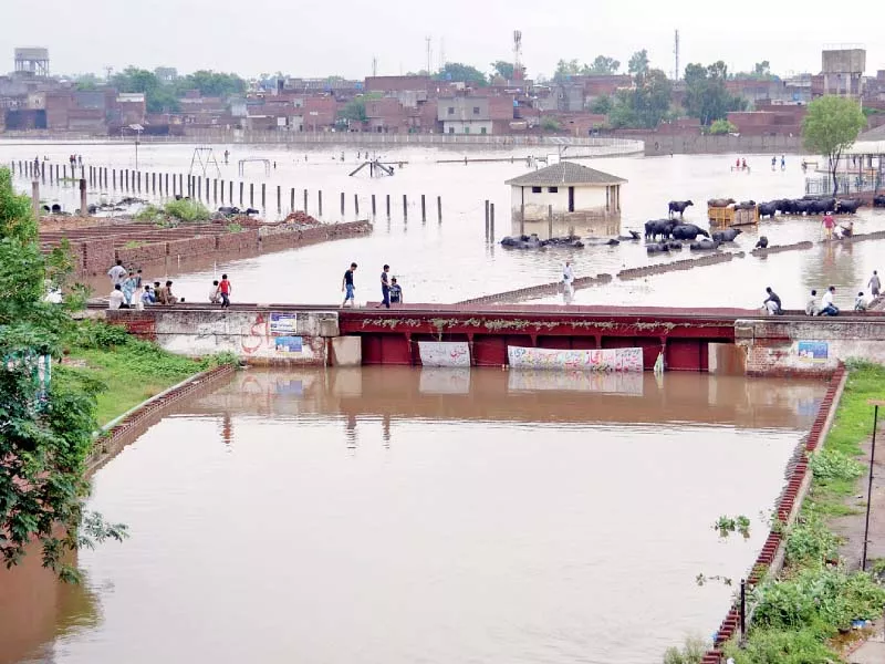 an underpass submerged in rainwater in gujranwala photo express an underpass submerged in rainwater in gujranwala photo express