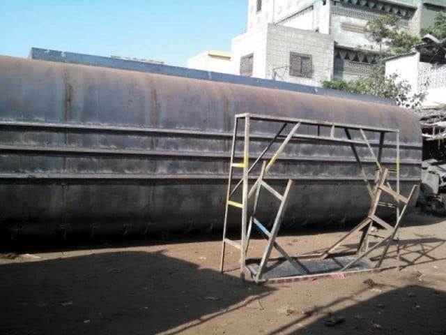 rescue officials emptied the tanks of the 22 wheeler vehicle and transferred the fuel to another tanker photo file