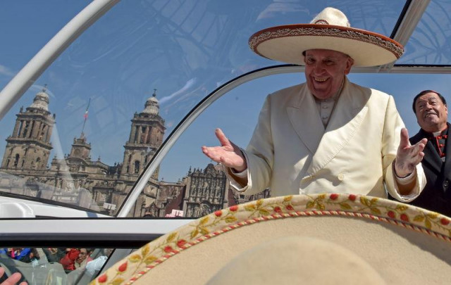 pope francis gestures while wearing a mariachi hat given to him by someone in the crowd on zocalo square in mexico city photo reuters pope francis gestures while wearing a mariachi hat given to him by someone in the crowd on zocalo square in mexico city photo reuters
