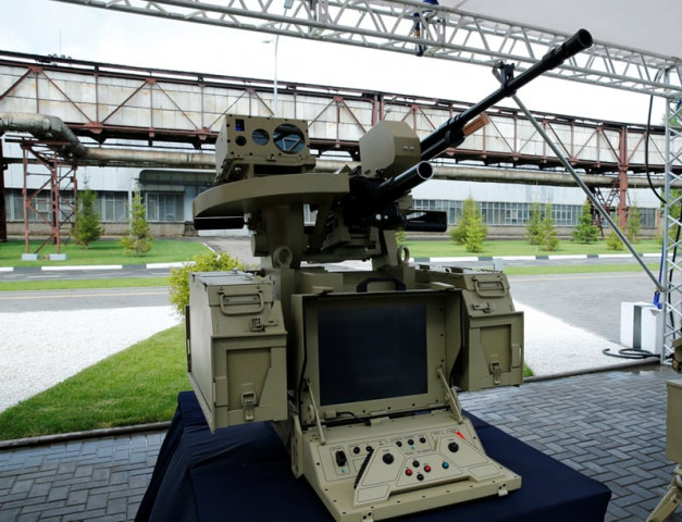 the company released images of one of the combat robots with kalashnikov s pk series of machine guns mounted atop photo courtesy kalashnikov the company released images of one of the combat robots with kalashnikov s pk series of machine guns mounted atop photo courtesy kalashnikov
