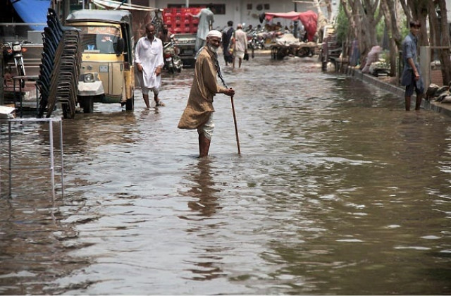 inundated an elderly man stands in stagnant rainwater on station road in hyderabad the city s streets were flooded after the monsoon rains on friday and saturday photo online inundated an elderly man stands in stagnant rainwater on station road in hyderabad the city s streets were flooded after the monsoon rains on friday and saturday photo online