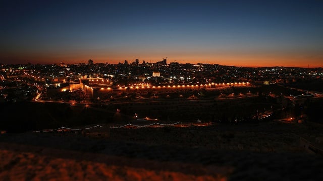 view of the old city of jerusalem with the dome of the rock c and al aqsa mosque l photo afp