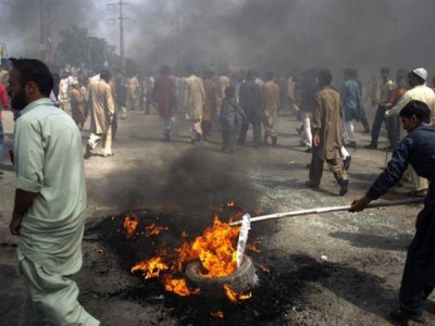 mob attacks police station in fateh jang to free arrested spiritual healer