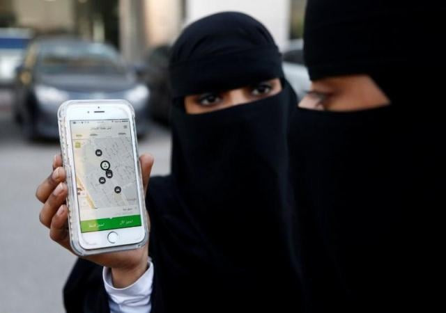 a saudi woman shows the careem app on her mobile phone in riyadh saudi arabia january 2 2017 photo reuters a saudi woman shows the careem app on her mobile phone in riyadh saudi arabia january 2 2017 photo reuters