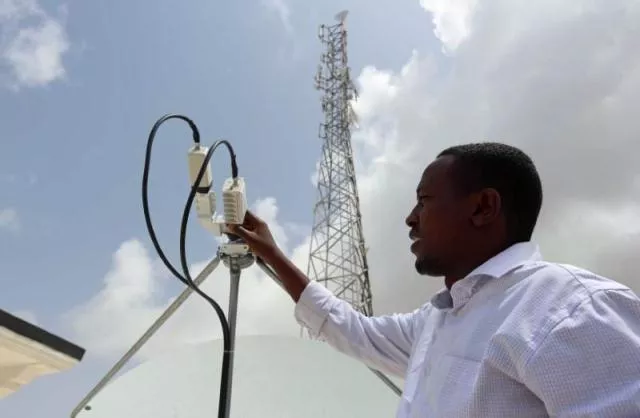 a somali optical networks soon technician checks a satellite dish at their headquarters in mogadishu somalia july 12 2017 photo reuters a somali optical networks soon technician checks a satellite dish at their headquarters in mogadishu somalia july 12 2017 photo reuters