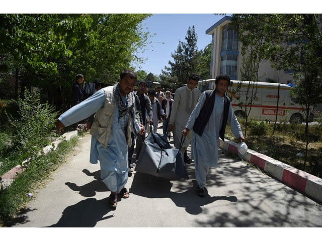 this file photo taken on may 31 2017 shows afghan volunteers carrying the body of a resident killed in a car bomb attack to the wazir akbar khan hospital in kabul photo afp this file photo taken on may 31 2017 shows afghan volunteers carrying the body of a resident killed in a car bomb attack to the wazir akbar khan hospital in kabul photo afp
