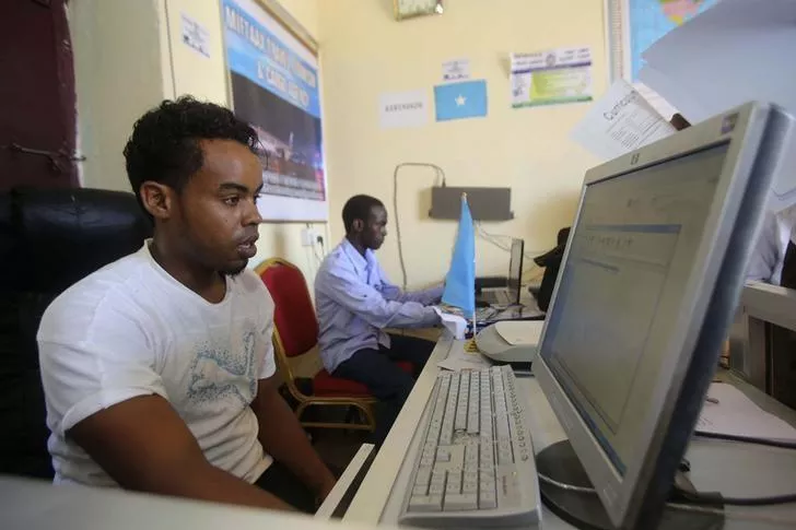 an internet cafe manager uses a computer in an internet cafe in the hodan area of mogadishu photo reuters an internet cafe manager uses a computer in an internet cafe in the hodan area of mogadishu photo reuters