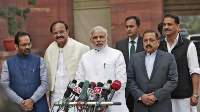 india 039 s prime minister narendra modi 3rd l speaks to the media as minister of state for parliamentary affairs mukhtar abbas naqvi l venkaiah naidu 2nd l minister of urban development jitendra singh 2nd r minister of state for prime minister office and rajiv pratap rudy r minister of state for skill development and entrepreneurship look on upon arrival on the opening day of the winter session of the indian parliament in new delhi photo reuters india 039 s prime minister narendra modi 3rd l speaks to the media as minister of state for parliamentary affairs mukhtar abbas naqvi l venkaiah naidu 2nd l minister of urban development jitendra singh 2nd r minister of state for prime minister office and rajiv pratap rudy r minister of state for skill development and entrepreneurship look on upon arrival on the opening day of the winter session of the indian parliament in new delhi photo reuters