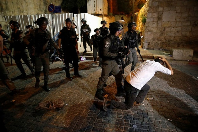 israeli border police clash with palestinian men during scuffles that erupted after palestinians held evening prayers outside the lion 039 s gate of jerusalem 039 s old city photo reuters israeli border police clash with palestinian men during scuffles that erupted after palestinians held evening prayers outside the lion 039 s gate of jerusalem 039 s old city photo reuters