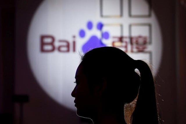 file photo a woman is silhouetted against the baidu logo at a new product launch from baidu in shanghai china november 26 2015 reuters aly song file photo file photo a woman is silhouetted against the baidu logo at a new product launch from baidu in shanghai china november 26 2015 reuters aly song file photo