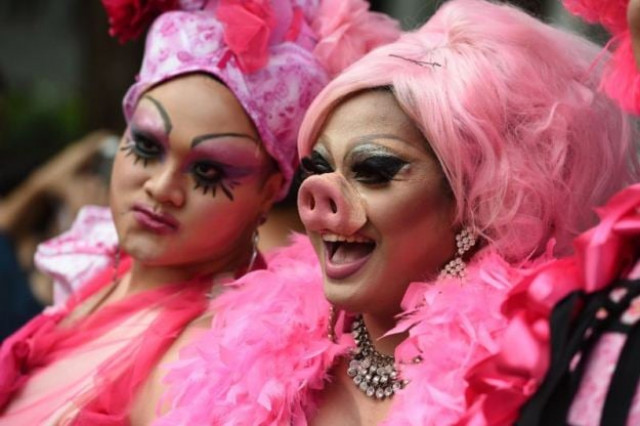 thousands gathered at a park for the annual pink dot gay pride event on saturday july 1 2017 in singapore photo reuters thousands gathered at a park for the annual pink dot gay pride event on saturday july 1 2017 in singapore photo reuters