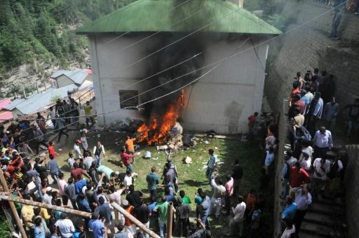 riots strikes as india rape accused killed in custody photo afp