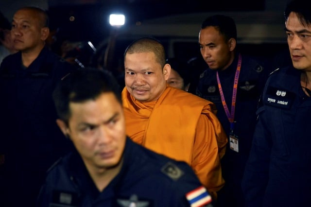 a former buddhist monk wirapol sukphol wanted on child sex charges is escorted by department of special investigation dsi officers as he arrives at the dsi headquarters in bangkok thailand july 19 2017 picture taken july 19 2017 photo reuters a former buddhist monk wirapol sukphol wanted on child sex charges is escorted by department of special investigation dsi officers as he arrives at the dsi headquarters in bangkok thailand july 19 2017 picture taken july 19 2017 photo reuters