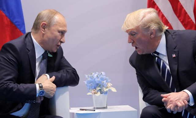 us president donald trump speaks with russian president vladimir putin during their bilateral meeting photo reuters us president donald trump speaks with russian president vladimir putin during their bilateral meeting photo reuters
