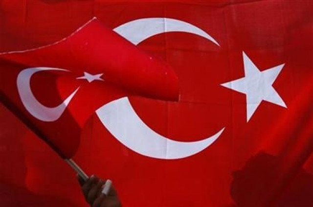 a palestinian child holds a turkish flag during a protest against israel in east jerusalem photo reuters a palestinian child holds a turkish flag during a protest against israel in east jerusalem photo reuters