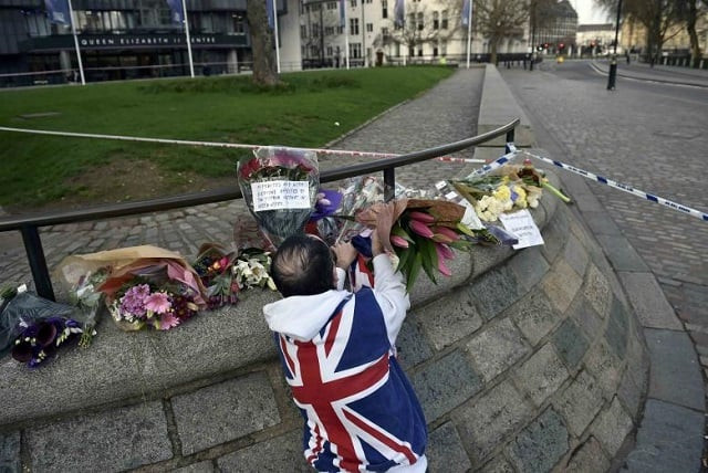 a man wears a union flag sweatshirt near the houses of parliament in westminster the day after an attack in london britain march 23 2017 photo reuters a man wears a union flag sweatshirt near the houses of parliament in westminster the day after an attack in london britain march 23 2017 photo reuters