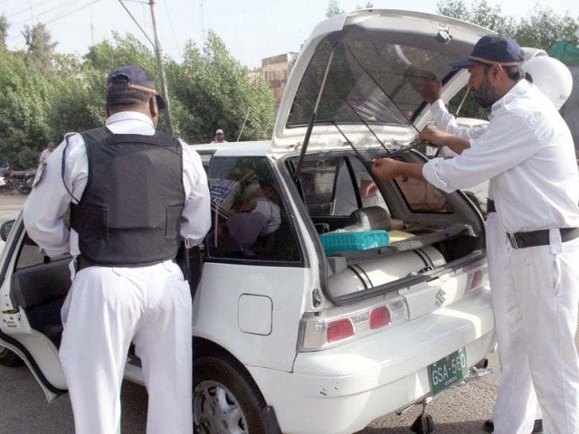 muhammad khan was controlling traffic near disco bakery when armed motorcyclists opened fire on him photo express file muhammad khan was controlling traffic near disco bakery when armed motorcyclists opened fire on him photo express file