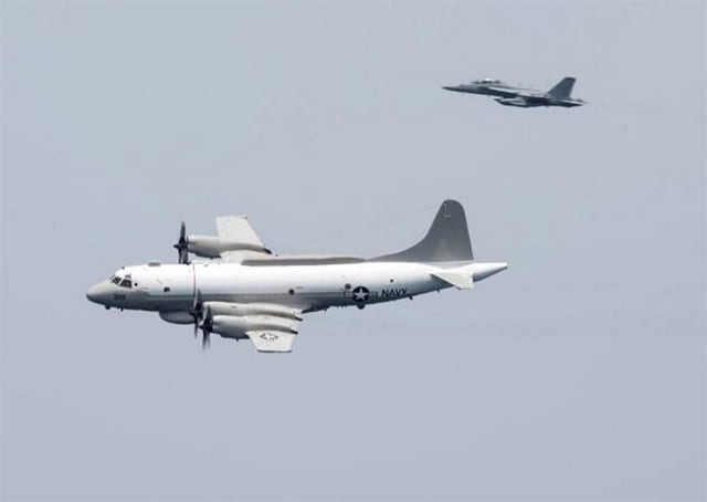 a us navy ep 3e aries signals reconnaissance aircraft escorted by an ea 18g growler electronic warfare aircraft performs a flyby over aircraft carrier uss harry s truman in the arabian gulf april 24 2016 photo reuters file a us navy ep 3e aries signals reconnaissance aircraft escorted by an ea 18g growler electronic warfare aircraft performs a flyby over aircraft carrier uss harry s truman in the arabian gulf april 24 2016 photo reuters file