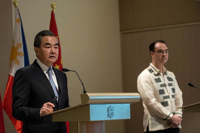 china 039 s foreign minister wang yi l and philippine foreign affairs secretary alan peter cayetano r attend a joint press conference in manila on july 25 2017 china urged southeast asian nations on july 25 to unite and quot say no quot to outside forces seeking to interfere in the south china sea dispute an apparent swipe at the united states ahead of a regional summit china 039 s foreign minister wang yi made the statement during a two day visit to manila where he hailed the quot strong momentum quot in the improvement of bilateral ties under philippine president rodrigo duterte photo afp china 039 s foreign minister wang yi l and philippine foreign affairs secretary alan peter cayetano r attend a joint press conference in manila on july 25 2017 china urged southeast asian nations on july 25 to unite and quot say no quot to outside forces seeking to interfere in the south china sea dispute an apparent swipe at the united states ahead of a regional summit china 039 s foreign minister wang yi made the statement during a two day visit to manila where he hailed the quot strong momentum quot in the improvement of bilateral ties under philippine president rodrigo duterte photo afp