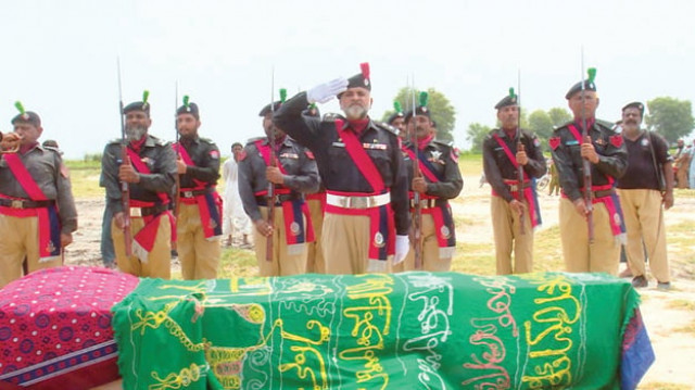 the martyred warden muhammad khan was laid to rest in his hometown pano aqil sukkur photo online