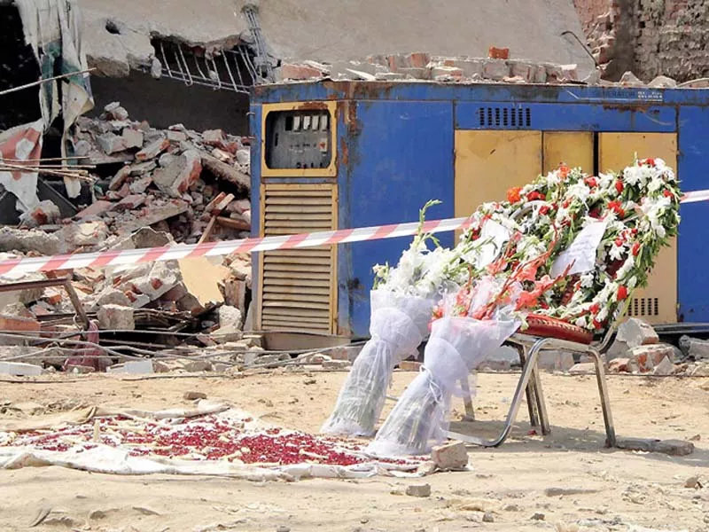 mourners have placed bouquets at the blast site in memory of the martyred photo nni mourners have placed bouquets at the blast site in memory of the martyred photo nni