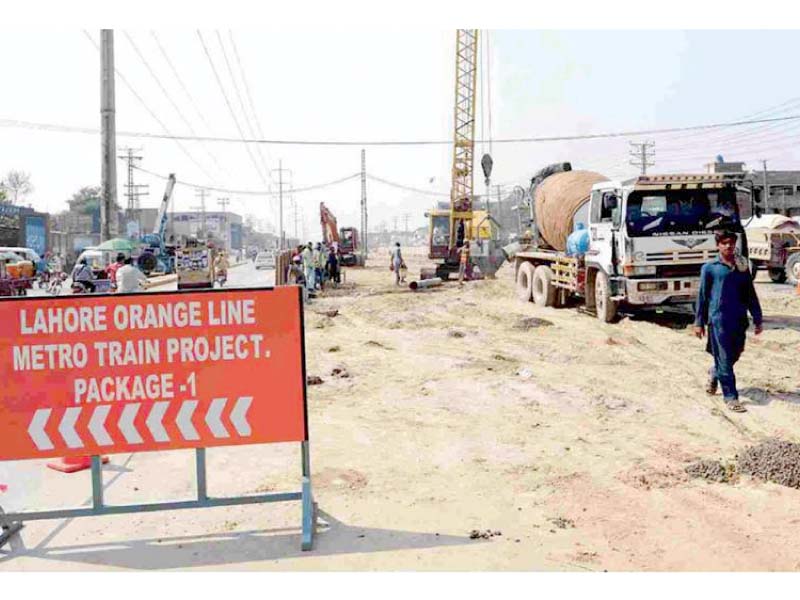 a caution board is placed at the construction site photo app