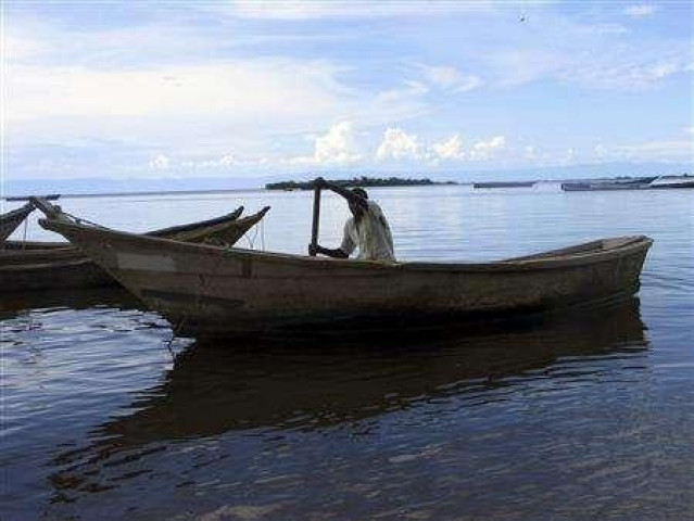 a fisherman paddles his boat photo reuters a fisherman paddles his boat photo reuters
