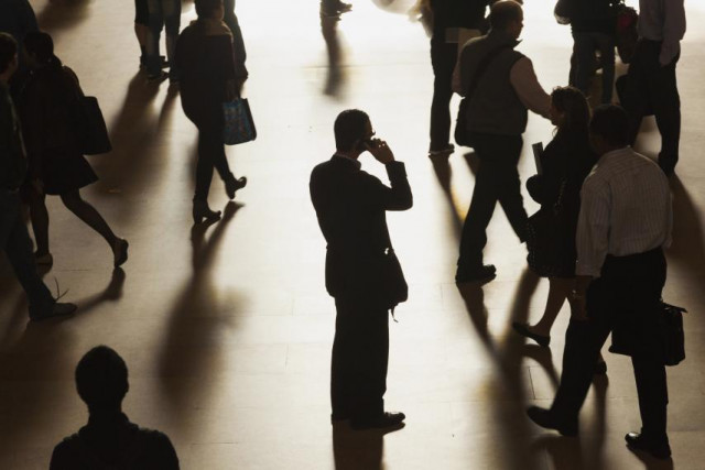 a man talking on his phone photo reuters a man talking on his phone photo reuters