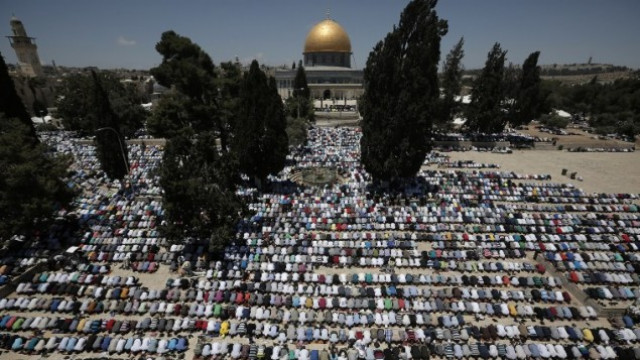 palestinian muslim worshipers pray outside the dome of the rock at the al aqsa compound in jerusalem during the first friday prayer of the holy month of ramadan photo afp palestinian muslim worshipers pray outside the dome of the rock at the al aqsa compound in jerusalem during the first friday prayer of the holy month of ramadan photo afp