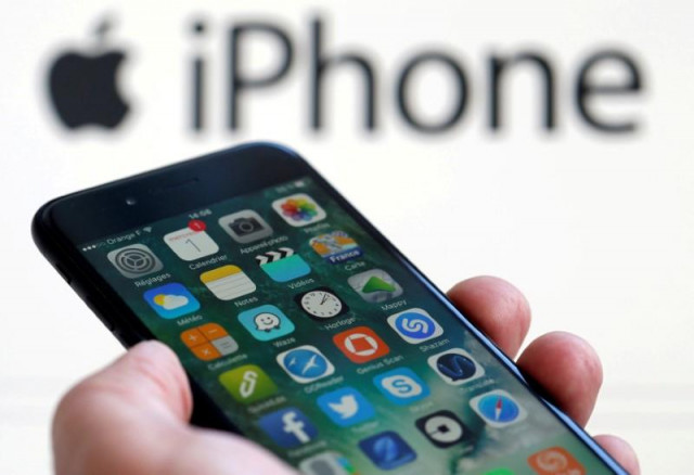 file photo an apple iphone 7 and the company logo are seen in this illustration picture taken in bordeaux france february 1 2017 photo reuters