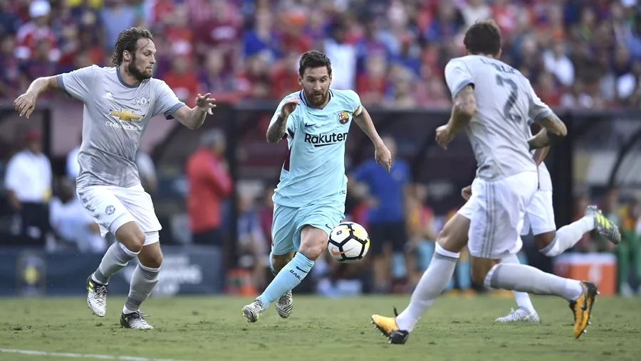 lionel messi c of barcelona tries to get past daley blind l and victor lindelof of manchester united during their international champions cup icc football match on july 26 2017 at the fedexfield in landover maryland photo afp lionel messi c of barcelona tries to get past daley blind l and victor lindelof of manchester united during their international champions cup icc football match on july 26 2017 at the fedexfield in landover maryland photo afp