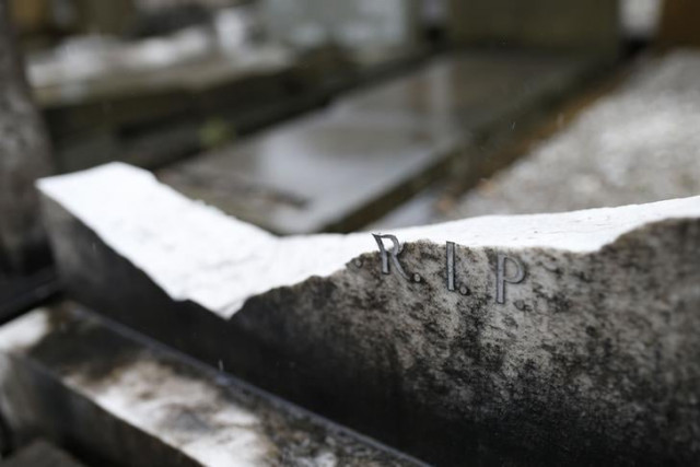 vandalised headstones are seen at a jewish cemetery in blackley manchester britain photo reuters vandalised headstones are seen at a jewish cemetery in blackley manchester britain photo reuters
