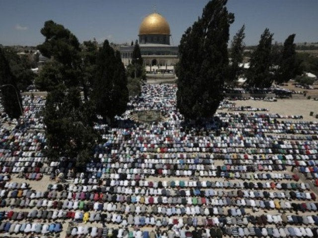 palestinian muslim worshipers pray outside the dome of the rock at the al aqsa compound in jerusalem during the first friday prayer of the holy month of ramadan photo afp palestinian muslim worshipers pray outside the dome of the rock at the al aqsa compound in jerusalem during the first friday prayer of the holy month of ramadan photo afp